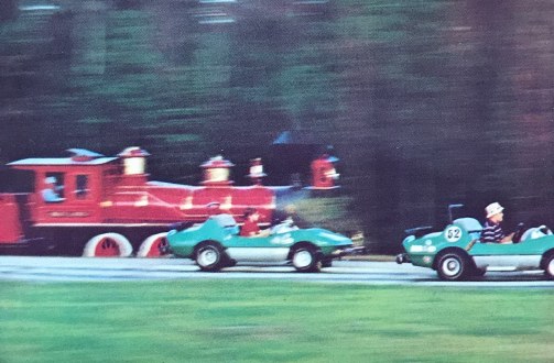 Walt Disney World Grand Prix cars race train
