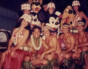 Walt Disney World Polynesian Luau cast members with Mickey and Minnie